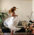 100% silk chiffon poncho cape top with flowy batwing sleeves.
